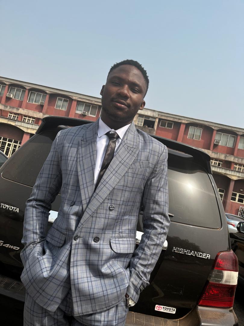 Anthony Obode in professional attire