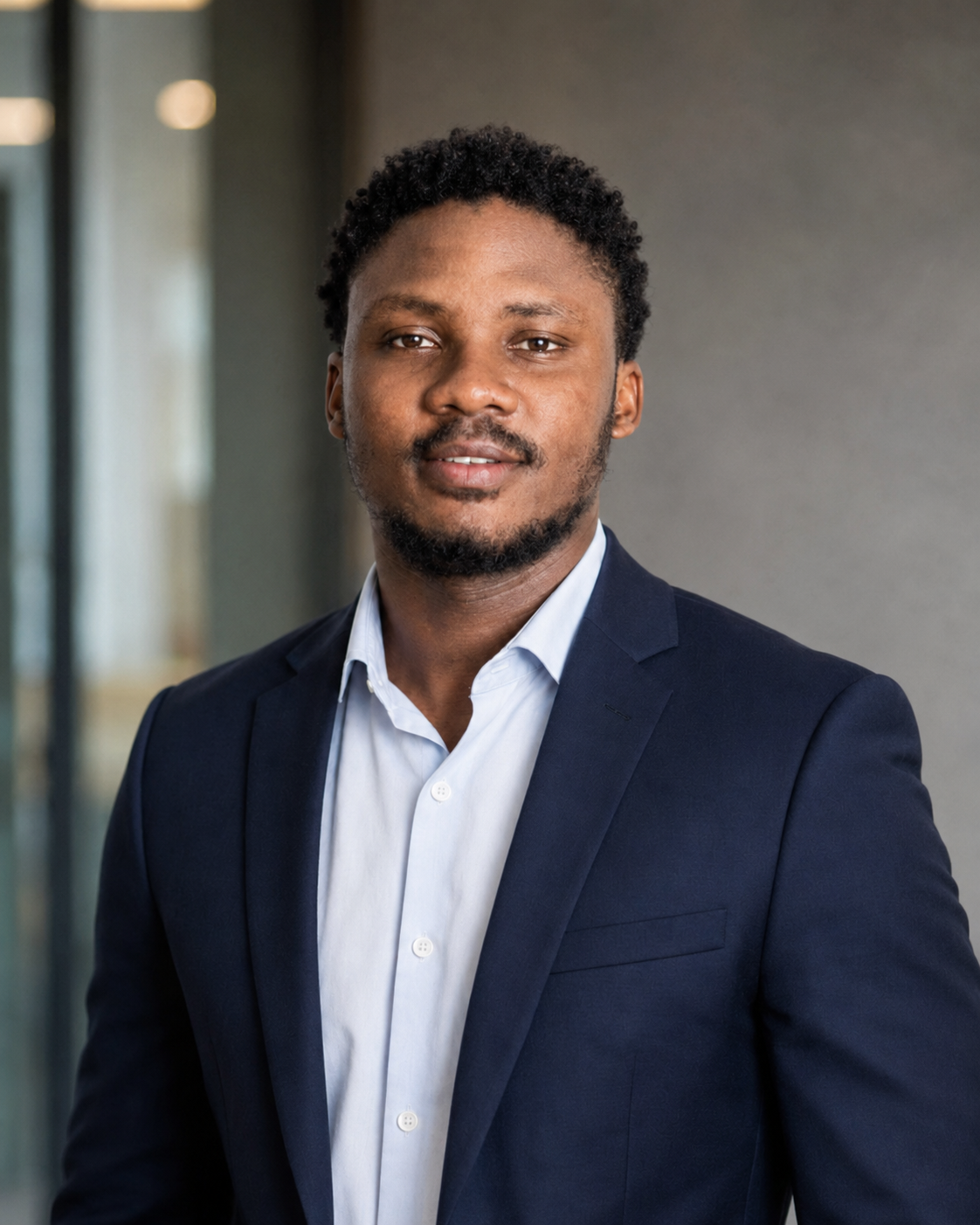 Anthony Obode in professional attire